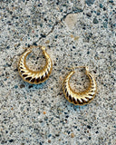 Gold Hoops in “Bebe”